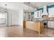 Open concept kitchen with an island and breakfast bar at 4759 Polo Gate Blvd, Charlotte, NC 28216
