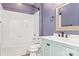 Clean bathroom with a tub, shower, and light-mint vanity at 4759 Polo Gate Blvd, Charlotte, NC 28216