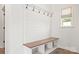 White shiplap entryway with built-in storage at 4759 Polo Gate Blvd, Charlotte, NC 28216