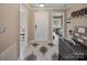 Inviting entryway with a decorative rug and access to other rooms at 18641 Harborside Dr, Cornelius, NC 28031