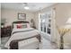 Bright bedroom featuring a comfortable bed and plenty of natural light at 18641 Harborside Dr, Cornelius, NC 28031