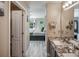 Elegant bathroom with granite countertops, double sinks, and a walk-in shower at 18641 Harborside Dr, Cornelius, NC 28031