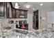 Modern kitchen with stainless steel appliances and granite countertops at 18641 Harborside Dr, Cornelius, NC 28031