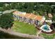 Aerial view of waterfront property with pool, tennis courts, and clubhouse at 18641 Harborside Dr, Cornelius, NC 28031