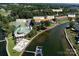 Aerial view showing property, clubhouse, marina, and tennis courts at 18641 Harborside Dr, Cornelius, NC 28031