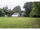 Large backyard with shed, trampoline, and open space at 3913 Belk Mill Rd, Wingate, NC 28174