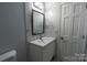 Bathroom with single vanity, toilet and shower/tub combo at 7125 Bisaner St, Charlotte, NC 28269