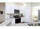 Modern kitchen with granite countertops and stainless steel appliances at 133 Ole Eastpointe Dr, York, SC 29745
