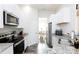Modern kitchen with stainless steel appliances and granite counters at 133 Ole Eastpointe Dr, York, SC 29745