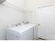 Laundry room with washer, dryer, and shelving for storage at 133 Ole Eastpointe Dr, York, SC 29745
