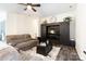 Spacious living room with large TV and comfortable seating at 133 Ole Eastpointe Dr, York, SC 29745