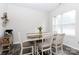 Bright dining area with a farmhouse table and neutral decor at 133 Ole Eastpointe Dr, York, SC 29745