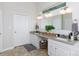 Double vanity bathroom with granite countertop and large mirror at 133 Ole Eastpointe Dr, York, SC 29745