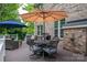 Spacious back deck with seating area, umbrella, and built-in grill at 4050 Halyard Dr, Denver, NC 28037