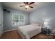 Bright bedroom with a double bed and window at 4050 Halyard Dr, Denver, NC 28037