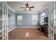 Bright office with hardwood floors, neutral walls, and French doors at 4050 Halyard Dr, Denver, NC 28037