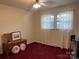 Bright bedroom with double window and red carpet at 4040 Angus Dr, Gastonia, NC 28056
