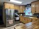 Kitchen with stainless steel appliances and wood cabinets at 4040 Angus Dr, Gastonia, NC 28056