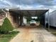 Brick house with carport, providing covered parking for two vehicles at 4040 Angus Dr, Gastonia, NC 28056