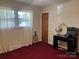 Bedroom with carpet, window, and workspace at 4040 Angus Dr, Gastonia, NC 28056