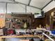 Organized workshop with tools and supplies on the walls and workbench at 4040 Angus Dr, Gastonia, NC 28056