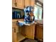 Kitchen features a pull-out mixer shelf and modern appliances at 4040 Angus Dr, Gastonia, NC 28056