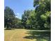 Spacious backyard with mature trees at 1270 Stanback Rd, Mount Gilead, NC 27306
