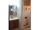 Simple bathroom with vanity and shower stall at 1270 Stanback Rd, Mount Gilead, NC 27306