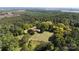 House situated on a large lot surrounded by trees at 1270 Stanback Rd, Mount Gilead, NC 27306