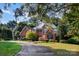 Brick two-story home with a curved driveway at 1408 Stone Gate Dr, Shelby, NC 28150