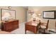 Spacious home office with wooden desk and cabinet at 1408 Stone Gate Dr, Shelby, NC 28150