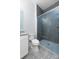 Contemporary bathroom with gray tile shower and patterned floor at 195 Agnew Rd, Mooresville, NC 28117