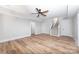 Spacious finished basement with vinyl flooring, neutral walls, and staircase at 195 Agnew Rd, Mooresville, NC 28117