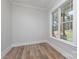 Bright office space with hardwood floors and large window at 195 Agnew Rd, Mooresville, NC 28117