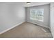 Spacious bedroom with neutral walls and carpeted floors at 1151 Glenbriar Ct, Woodleaf, NC 27054