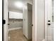 Bright laundry room with ample storage and tile flooring at 2510 Doster Rd, Monroe, NC 28112