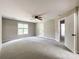 Spacious bedroom with ceiling fan and access to another room at 2510 Doster Rd, Monroe, NC 28112
