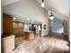 Open kitchen with island, hardwood floors, and stainless steel appliances at 2510 Doster Rd, Monroe, NC 28112