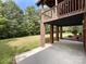 Brick patio with access to a wooded backyard at 2510 Doster Rd, Monroe, NC 28112