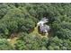House nestled in a large wooded lot at 2510 Doster Rd, Monroe, NC 28112