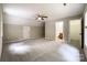 Spacious bedroom with ceiling fan and en-suite bathroom at 2510 Doster Rd, Monroe, NC 28112