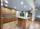 Kitchen features wood cabinets, granite countertops, and stainless steel appliances at 2510 Doster Rd, Monroe, NC 28112