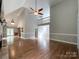 Open living area with high ceilings and hardwood floors at 2510 Doster Rd, Monroe, NC 28112
