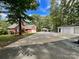 Brick house with attached garage and a long driveway at 2510 Doster Rd, Monroe, NC 28112