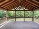 Spacious deck with ceiling fan, overlooking a wooded backyard at 2510 Doster Rd, Monroe, NC 28112