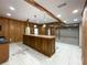 Open concept basement with kitchen and large living area at 2510 Doster Rd, Monroe, NC 28112