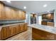 Wood cabinets, granite countertops and stainless steel appliances in this kitchen at 2510 Doster Rd, Monroe, NC 28112