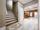Basement stairs leading to a finished basement with bar at 2510 Doster Rd, Monroe, NC 28112