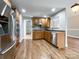 Stainless steel appliances and hardwood floors in this kitchen at 2510 Doster Rd, Monroe, NC 28112