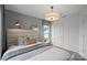 Bright bedroom with a comfortable bed and stylish decor at 10029 Guardian E Dr # 264, Charlotte, NC 28273